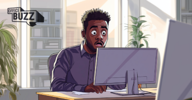 a man looking stunned at his laptop