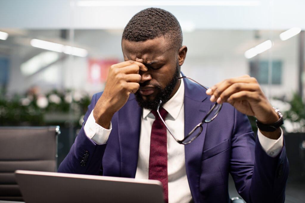 a tired frustrated looking black man