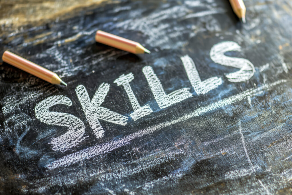 skills based hiring written on a black board.