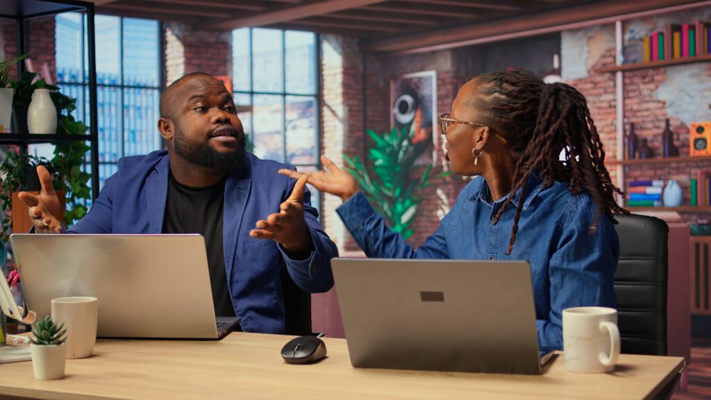 a black man and woman arguing