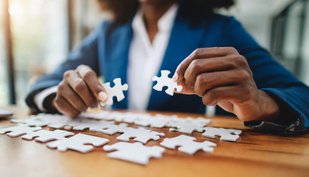 a woman holding a puzzle