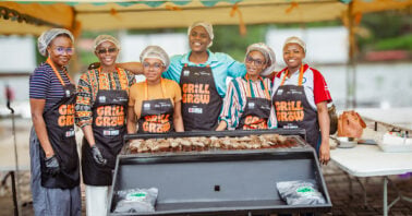 Women participants in the Grill & Grow Program learning grilling techniques during hands-on training in Accra, Ghana