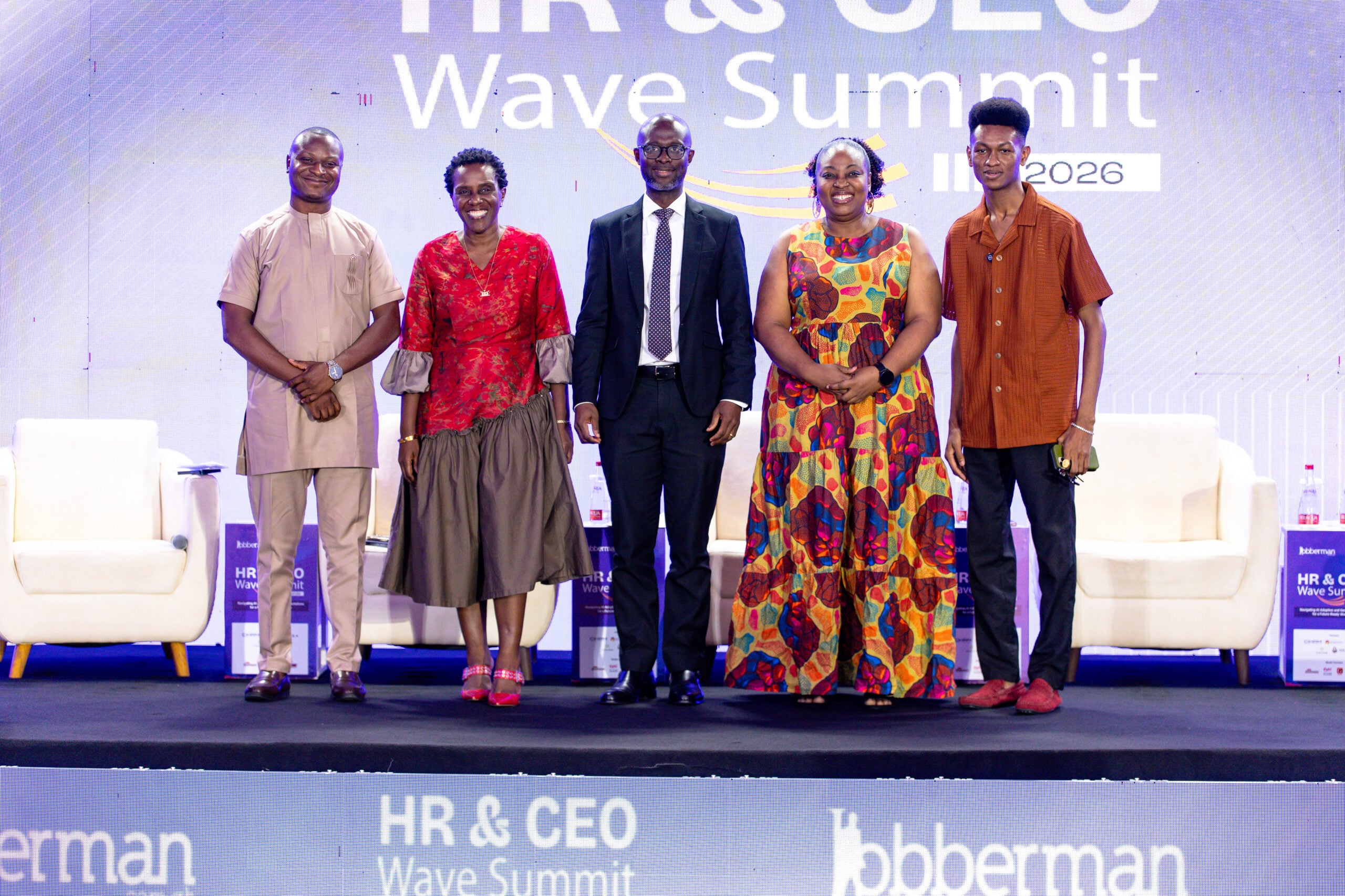 Panelists and business leaders standing together on stage at the HR and CEO Wave Summit 2026 hosted by Jobberman Ghana.